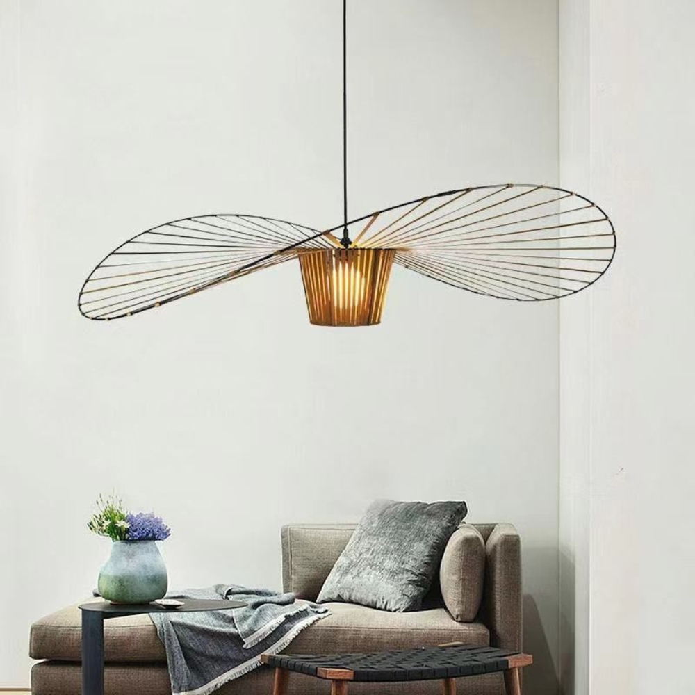 Pendant lamp hanging in a minimalist bedroom with soft lighting